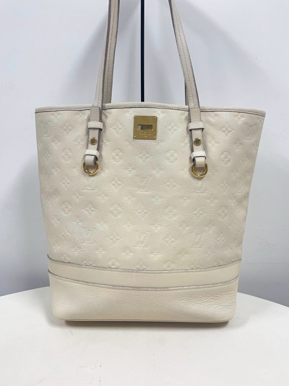 Authentic Louis Vuitton Cream Embossed Monogram Leather Tote with Gold Hardware